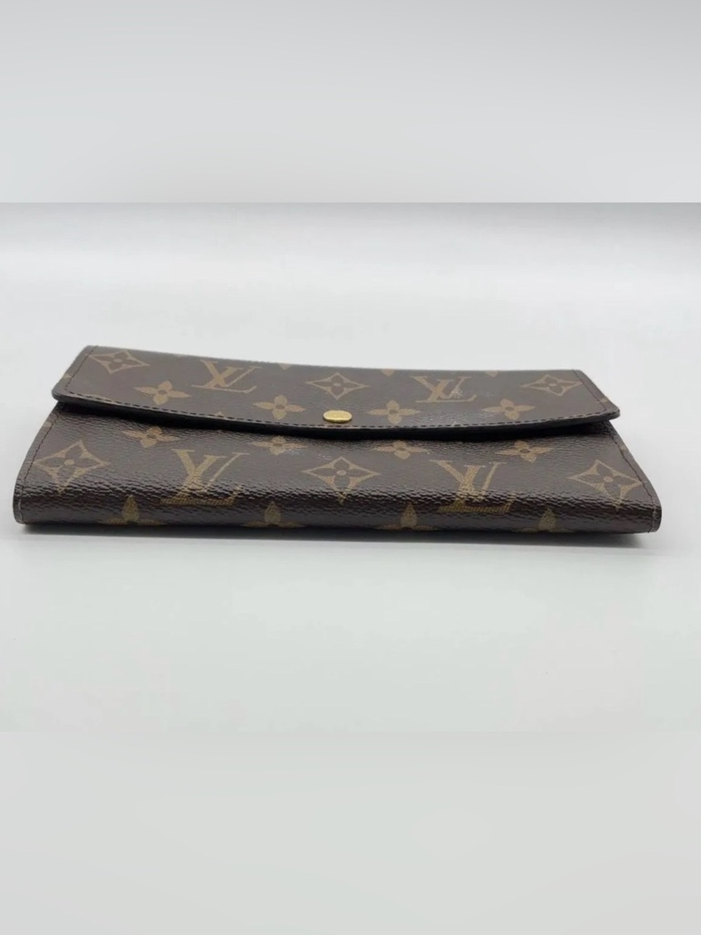 Auth Louis Vuitton Monogram
Portefeuille Sarah Long Wallet